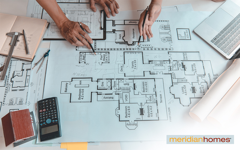 Interior designers planning the layout of a home renovation