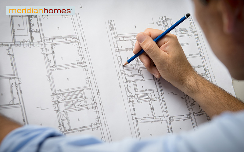 An architect designing the floor plan