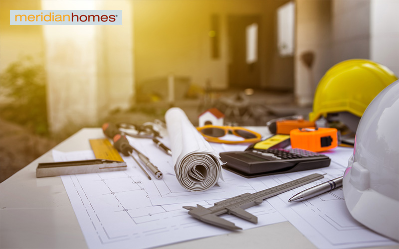 Construction tools and materials on a table