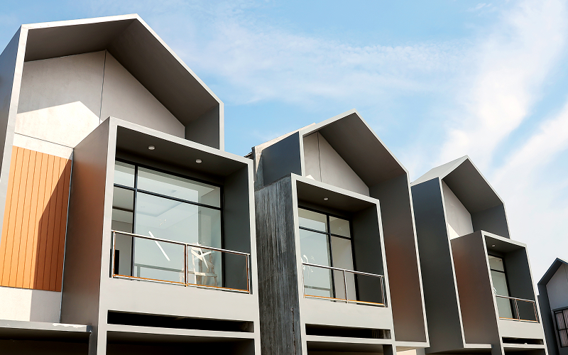 Modern facade of newly rebuilt terraced houses in Singapore.
